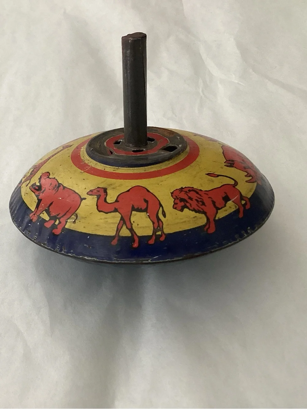 Vtg. Ohio Art Tin Lithographed Spinning toy top.  Design of zoo animals